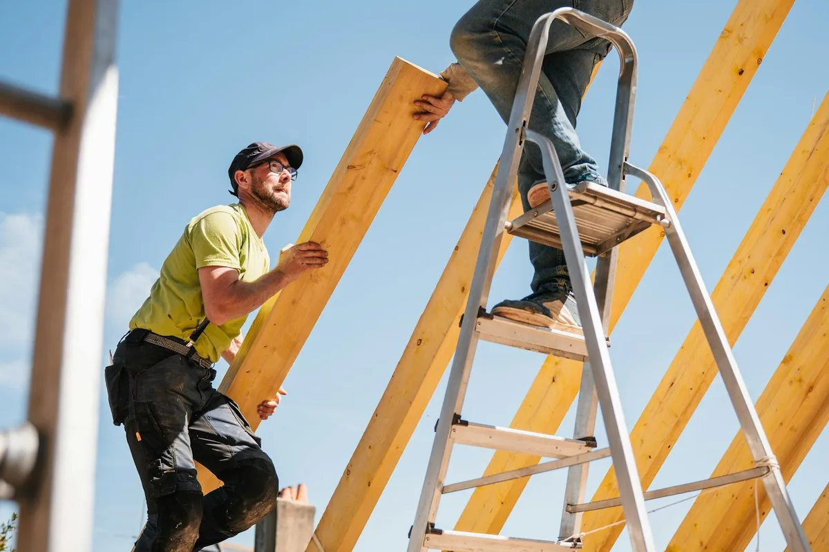 Workers framing on a job site